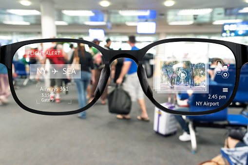 Augmented Marketing And Smart Ar Glasses Technology Concept Customer Using Ar Application To Monitoring Alert Airline Flight Blur Airport Background Stock - Image Now - iStock