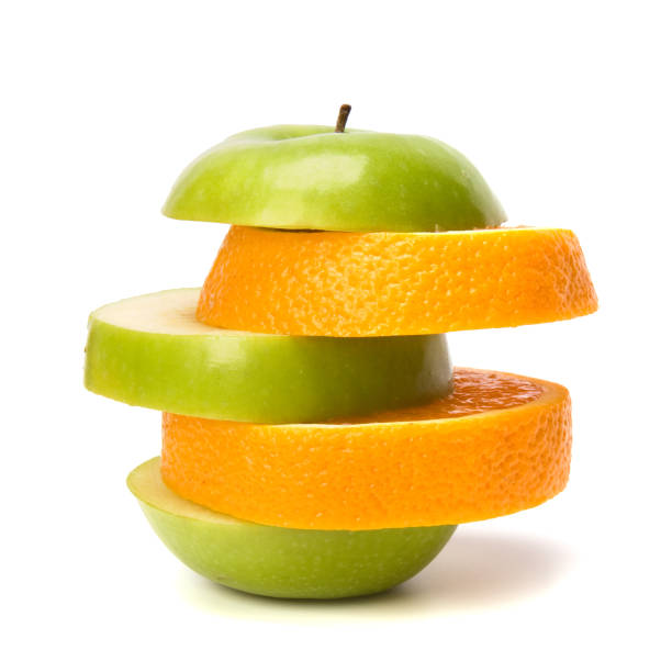 istock mixed sliced fruits and pills isolated on white background 831433268