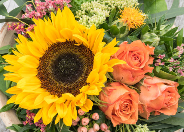 istock Close up of rustic sunflower arrangement. 831433366
