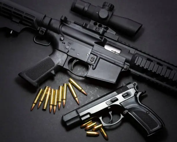 9mm handgun with ar15 rifle and ammunition