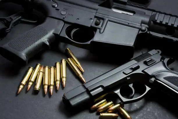 9mm handgun with ar15 rifle and ammunition