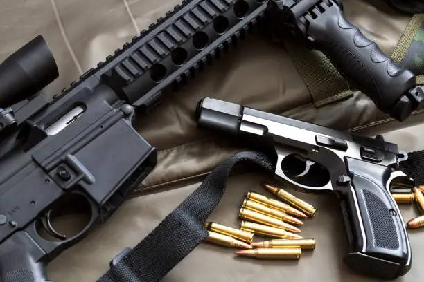 9mm handgun with ar15 rifle and ammunition