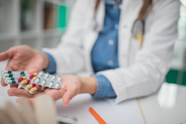 istock Doctor holding medicine in hand 831434296