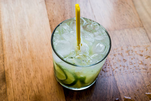 Caipirinha Cocktail with lime and ice.