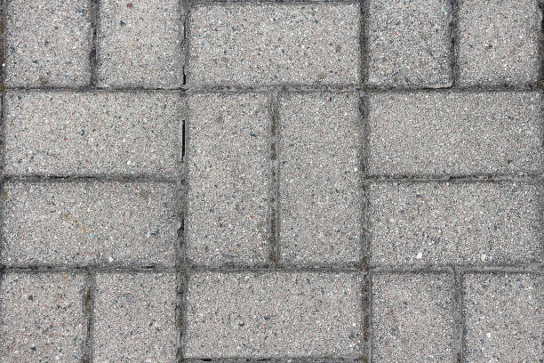 istock Gray texture of paving slab close-up for background 831449986