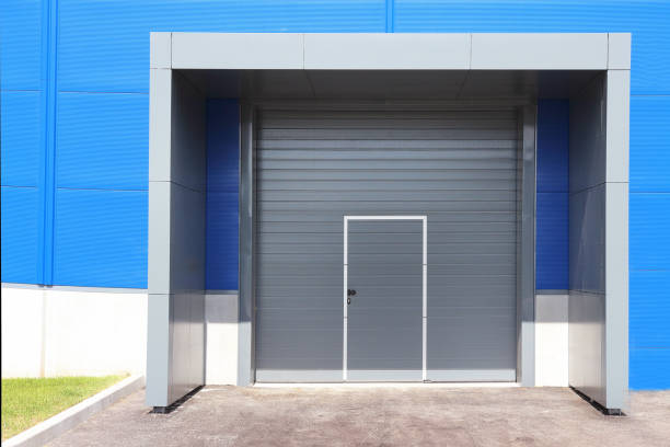 istock Roller shutter door of logistic center for industrial background 831450000