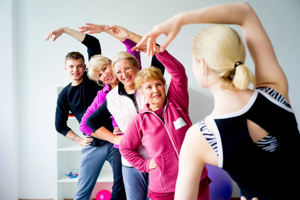 istock Group of seniors doing exercises 831452820