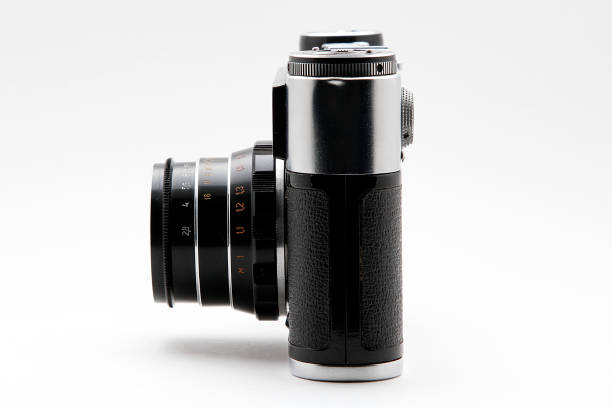 istock Film photo camera on white background 831453458