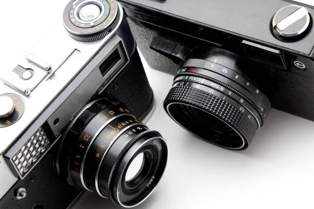 istock Film photo camera on white background 831455610