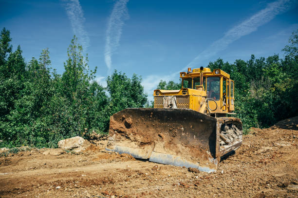 istock Big industrial yellow excavator on construction site 831456362