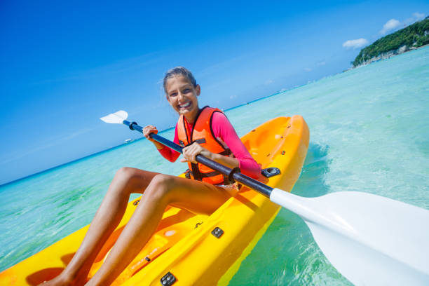 istock Beautiful Girl With Kayak Paddle 831466150