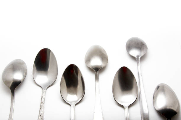 istock Metal spoon on a white background 831481562