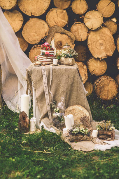 istock decorated table for two decorated with floral composition wood background 831493406