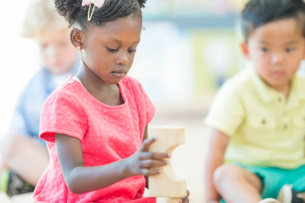 istock Building a Wood Block Tower 831502066
