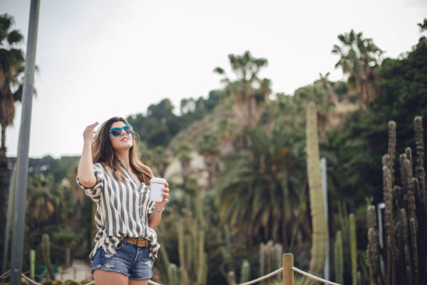 istock Woman in public park 831502114