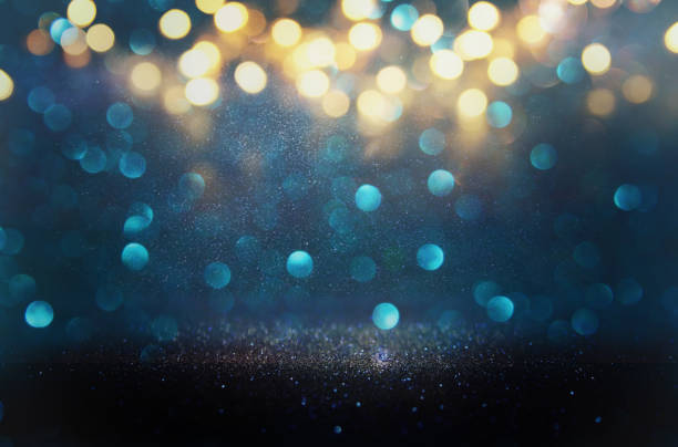istock glitter vintage lights background. defocused 831502768