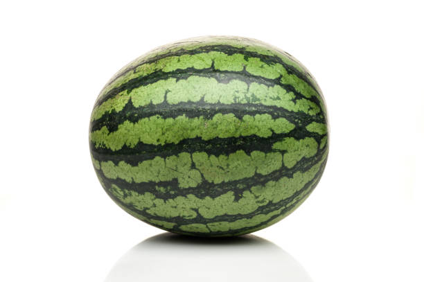 istock watermelon standing isolated on white background 831505466