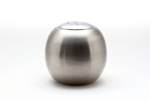 istock Metal salt and pepper shakers on white background 831509028