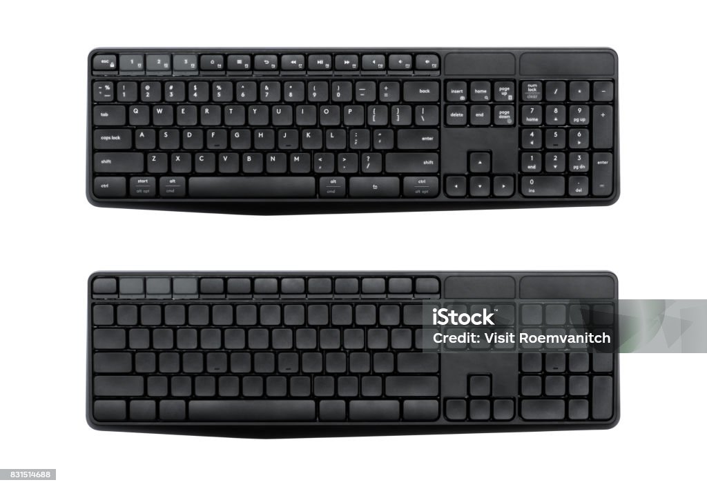 Top view of Wireless computer keyboard isolated on white background with clipping path inside. Top view of Full size wireless desktop computer keyboard isolated on white background with clipping path inside. (Eng and empty alphabet) Computer Keyboard Stock Photo