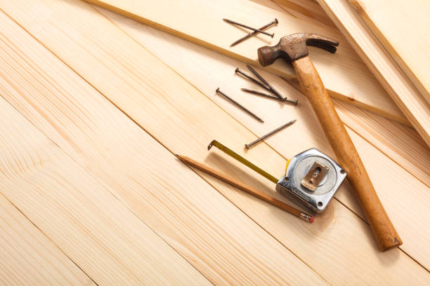 istock carpentry tools on wooden background, top view. Empty space for Your text 831524812