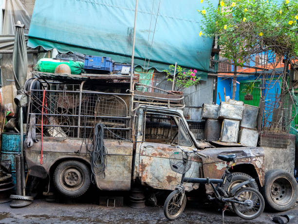 istock Wrecked car in the old street 831525072