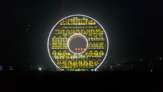 Guangzhou Circle is a 138 m (453 ft) landmark building in the south west part of Guangzhou, Guangdong province, China and designed by Italian architect Joseph di Pasquale. It is the headquarters of the Hongda Xingye Group and also hosts the Guangdong Plastic Exchange which is a trading centre for raw plastic material.