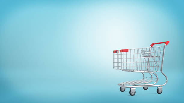 istock 3d rendering of a shopping cart with a red handle isolated on blue background 831533268