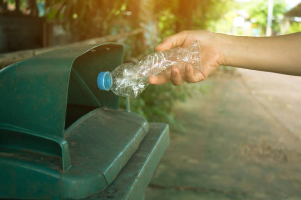 istock Women volunteer help garbage collection charity environment. 831533424