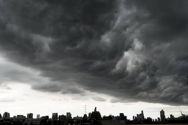 istock Storm clouds with Building in Bangkok, THAILAND 831533518