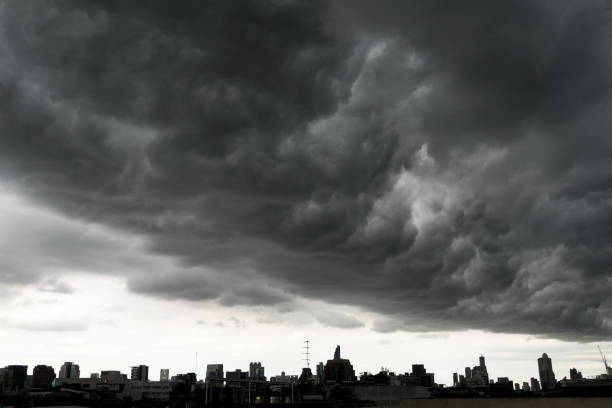 istock Storm clouds with Building in Bangkok, THAILAND 831533566