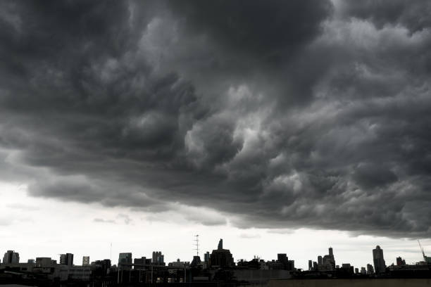 istock Storm clouds with Building in Bangkok, THAILAND 831533578