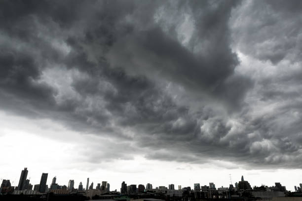 istock Storm clouds with Building in Bangkok, THAILAND 831533580