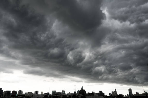 istock Storm clouds with Building in Bangkok, THAILAND 831533582