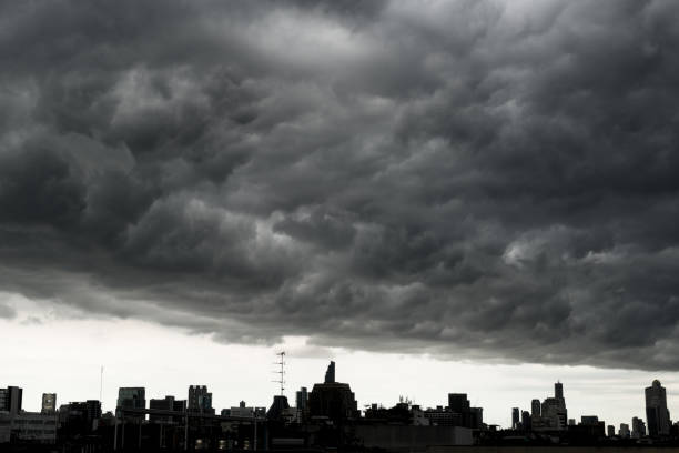 istock Storm clouds with Building in Bangkok, THAILAND 831533614
