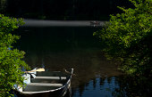 Poeple lake fishing from row boats