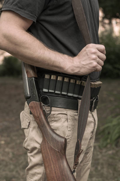 istock hunting rifle and cartridges 831537882