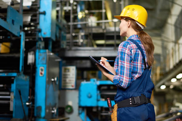 istock Young Woman Doing Inventory at Modern Plant 831540366