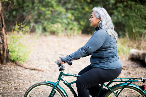 istock Beautiful Mexican Woman Biking 831540958