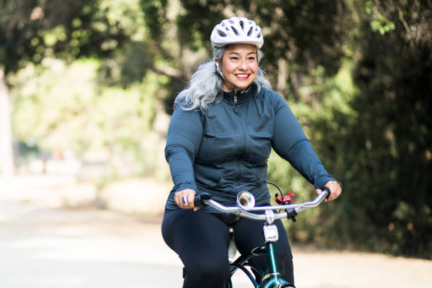 istock Beautiful Mexican Woman Biking 831540992