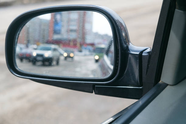 istock Motion blur the wing mirror of a car 831544320