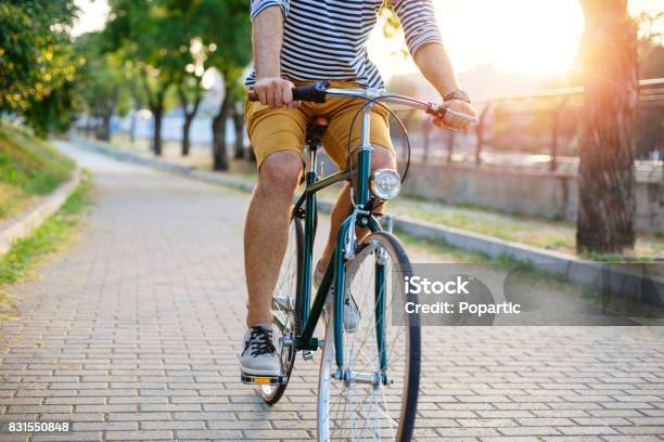 Cycling Through The Park Stock Photo - Download Image Now - Cycling, Public Park, Bicycle