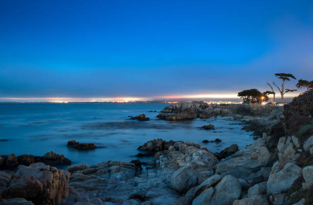 Beautiful Pacific Grove at Twilight Pacific Grove, on the Monterey Peninsula, along the California Coast is a really beautiful spot and a tourist attraction, famous for the 17 Mile Drive. pacific grove stock pictures, royalty-free photos & images