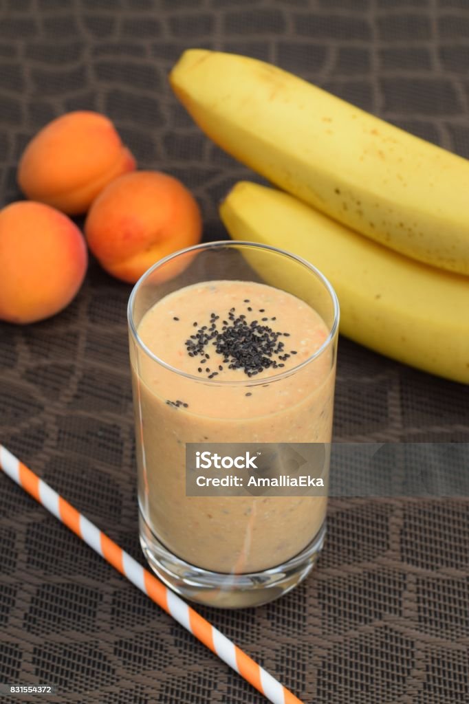 Banana apricot smoothie banana apricot smoothie with sweet basil seeds Apricot Stock Photo