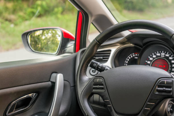 istock Car interior with steering wheel and dashboard 831555226