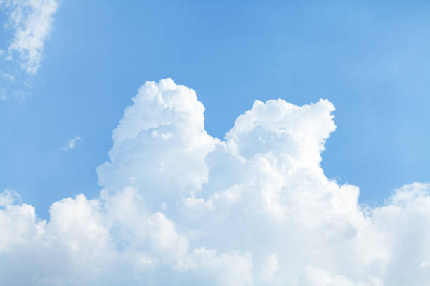 istock Rising and growing cumulus clouds 831559496