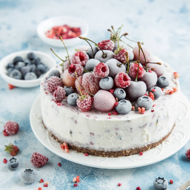istock berry ice cream cake served with frozen berries 831559632
