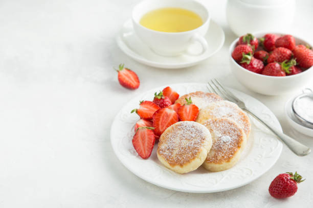 istock cottage cheese pancakes with fresh strawberry for breakfast 831559688
