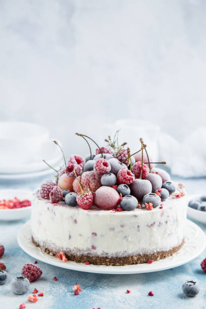 istock ice cream cake with frozen berries 831559806