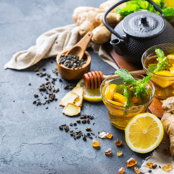 istock Japanese chinese tea teapot lemon ginger mint 831563176