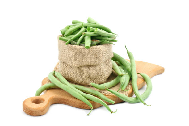 istock Fresh green beans on a cutting Board 831564020